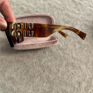 Miu Miu Tortoise Shell Sunglasses